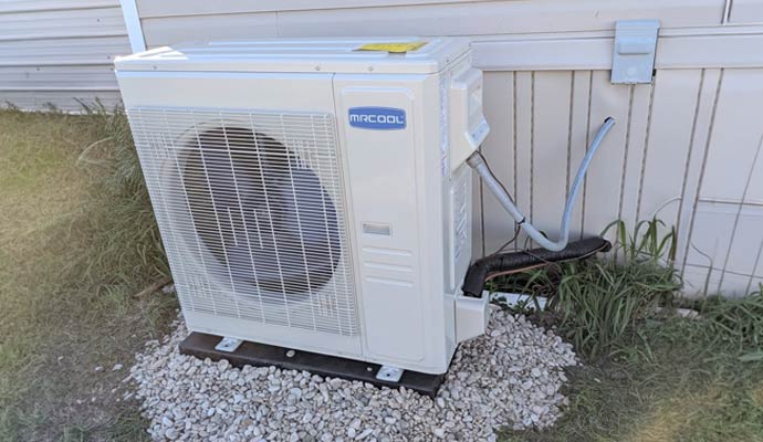 An outdoor air conditioning compressor unit