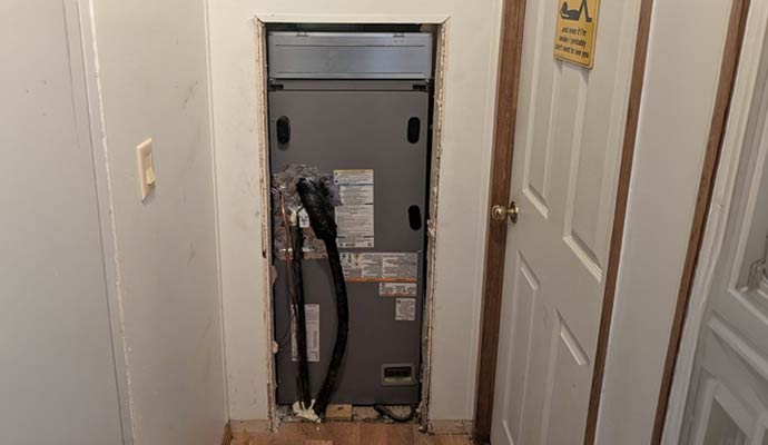 Installed air conditioning in a residential wall closet