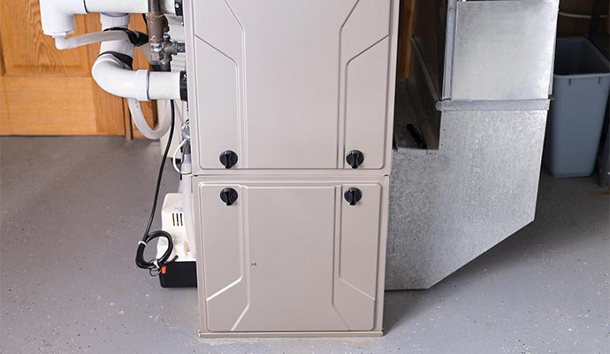Modern residential furnace installed in basement