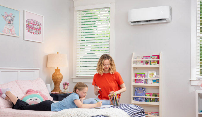 Mother and daughter in bedroom