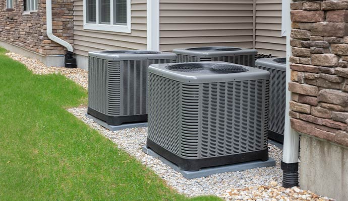Residential outdoor AC units lined up for maintenance