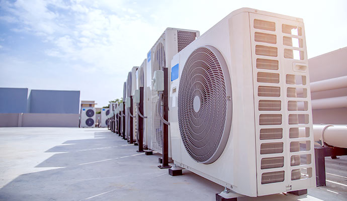 Row of rooftop AC units