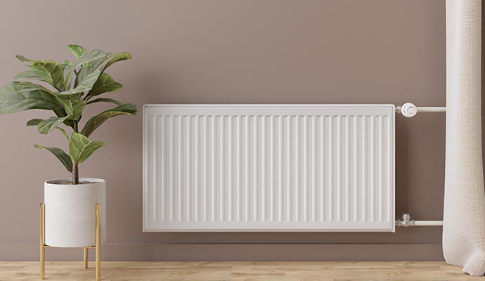 Wall mounted radiator in modern house interior