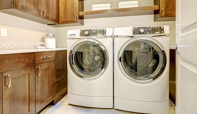 Washer and dryer with cabinets