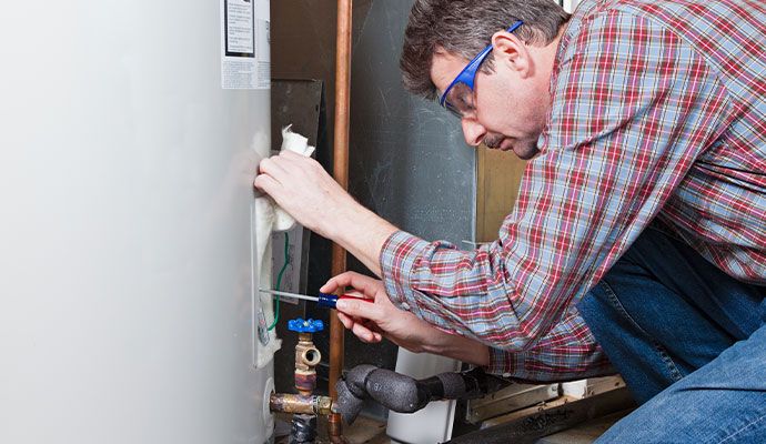 A professional repairing water heater system